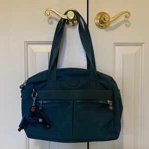 Kipling Live-light teal duffle tote. Pristine condition with charm.